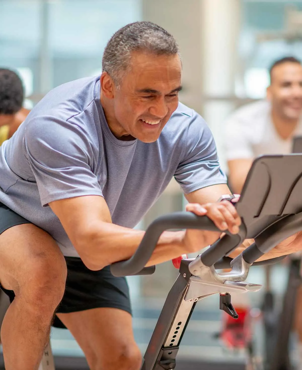 Pritikin Longevity Center mature man on stationary bike